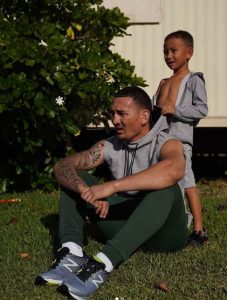 Max Holloway with his son