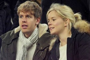 Caption: Sebastian Vettel with his girlfriend Hanna Prater