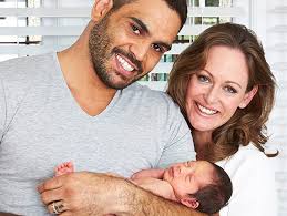 Greg Inglis with his wife and child