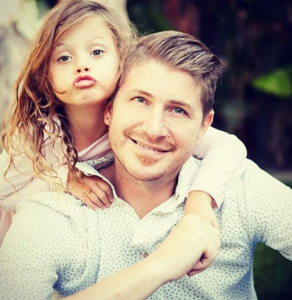 Joshua Faulkner with his daughter