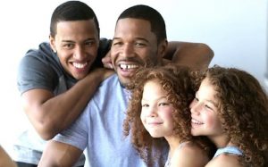 Michael Strahan Jr with his father and siblings