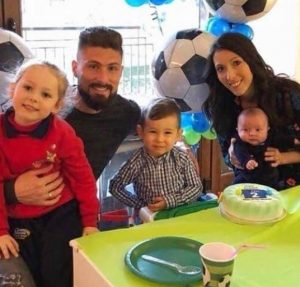 Jennifer Giroud with her husband and kids