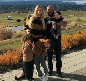 Demetrious Johnson with his wife and children