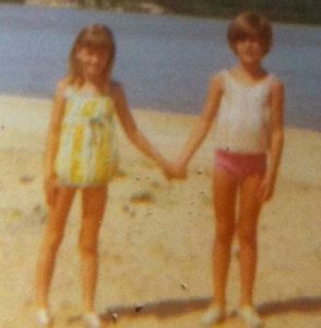 Natalie Allan with her sister, Susan Devis during her childhood