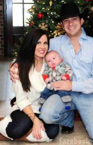 Jennifer with her husband and child