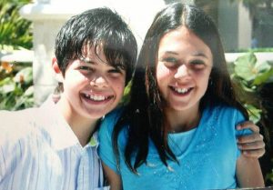Taylor with her brother in childhood