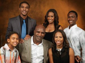 Evette with her father and siblings