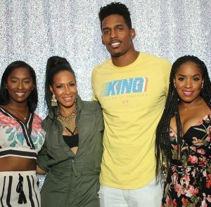 Kairo Whitfield with his mother and siblings