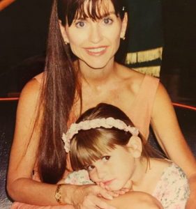 Bianca Haase with her mother during her childhood
