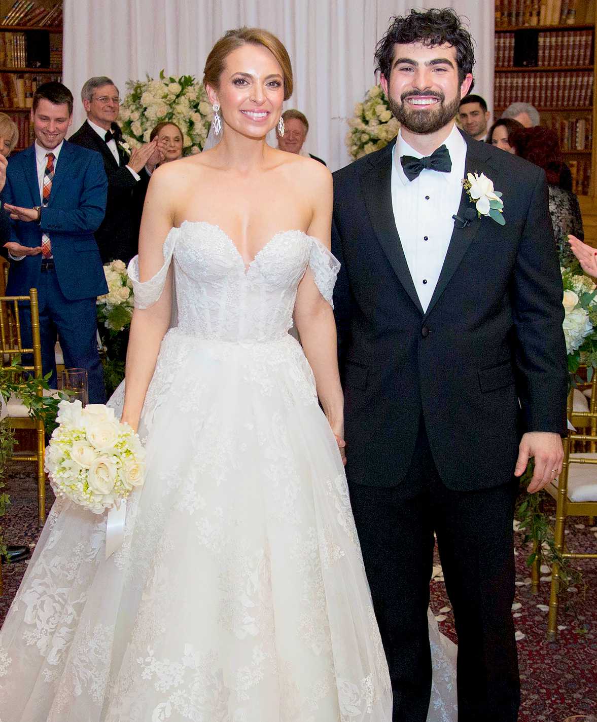 Jeremy Scher with his wife Jedediah in their wedding dress