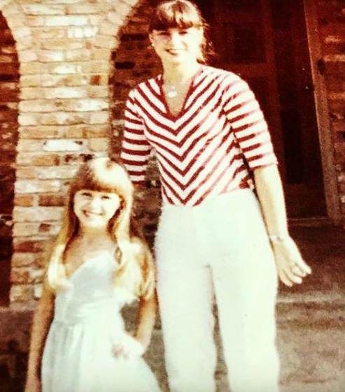 Sunshine Deia Tutt with her mother during her childhood