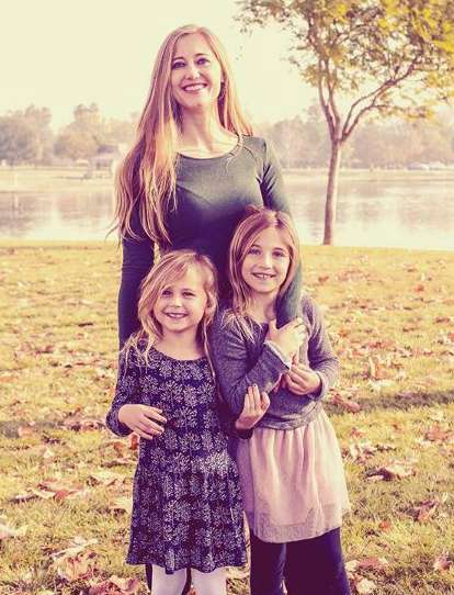 Zach McGowan's wife, Emily Johnson and two daughters