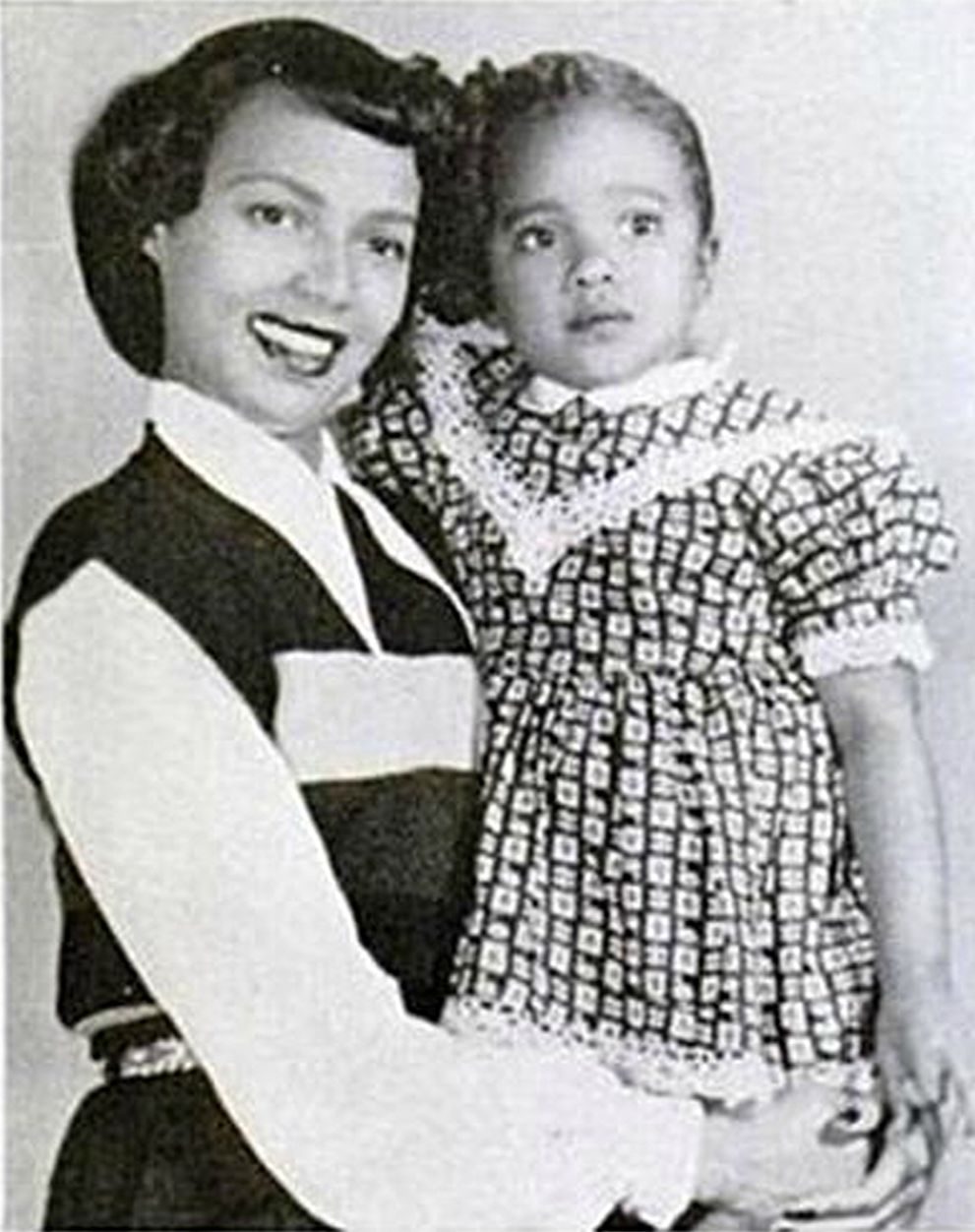 Harolyn Suzanne Nicholas with her late mother in childhood picture