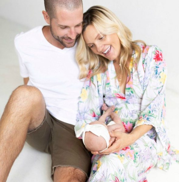 Kevin Simshauser with his wife Taylor & their daughter
