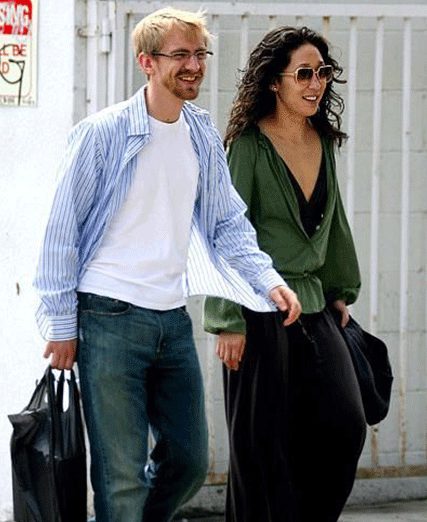 Andrew Featherston with his girlfriend, Sandra Oh