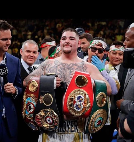 Andy Ruiz Jr with his different tittles