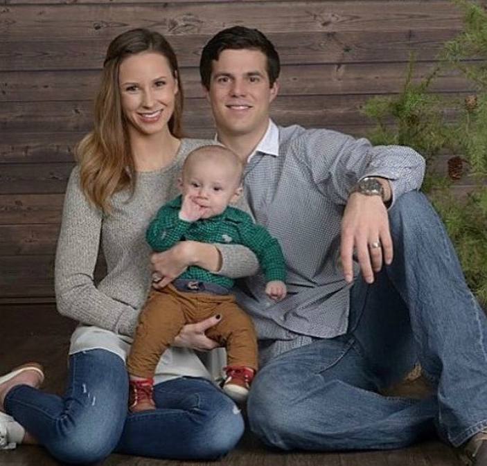 Ashlen Cyr with her husband and child