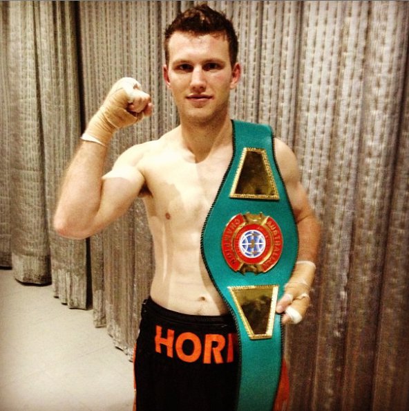 Jeffrey Horn's first title win and posing for photo