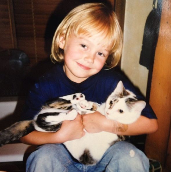 Birgen Anika Hartman childhood picture with cat
