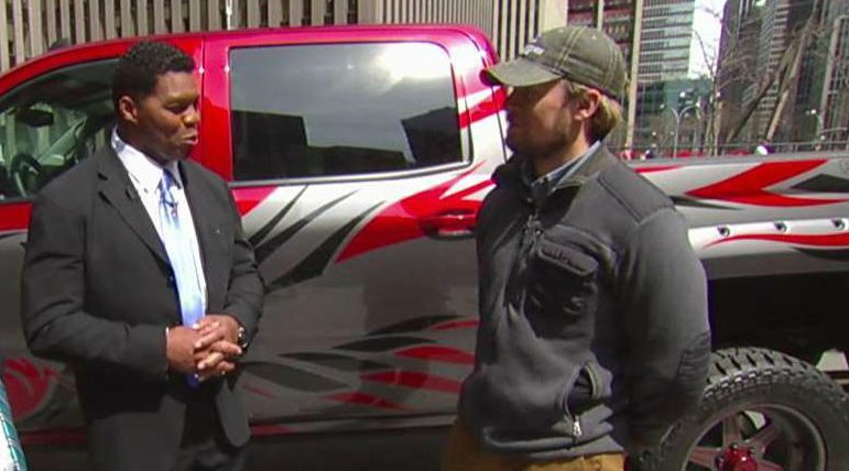 Herschel Walker presents veteran with custom truck