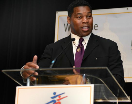 Herschel Walker giving speech in Mental health program