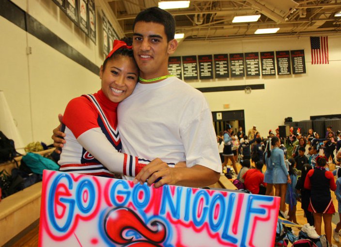 Marcus Mariota with his girlfriend, Kiyomi Cook while she was a cheerleader