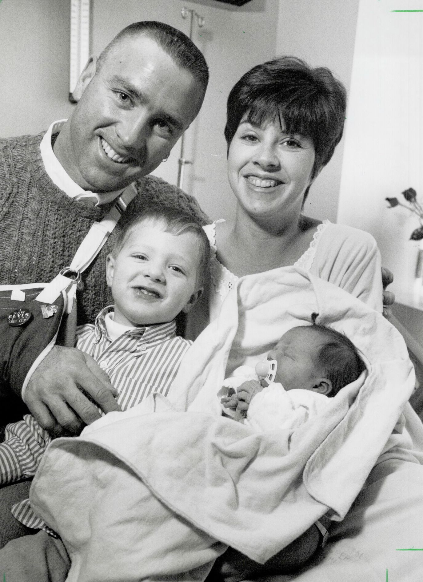 Matt Dunigan with his wife and kids