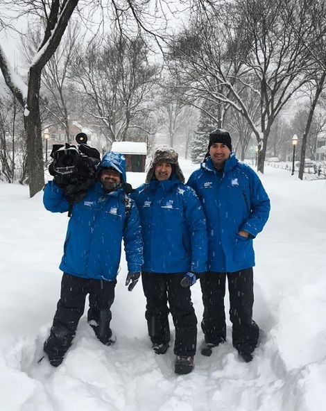 Jim Cantore doing reporting with his team