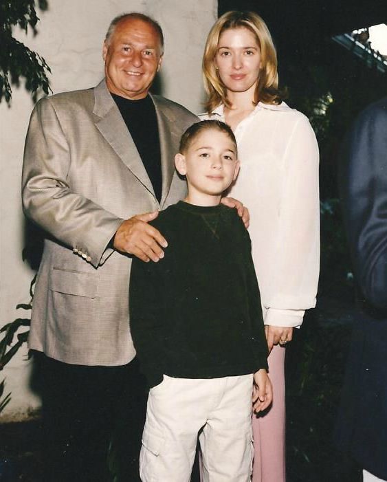 Tommy Zizzo with his mother and step-father