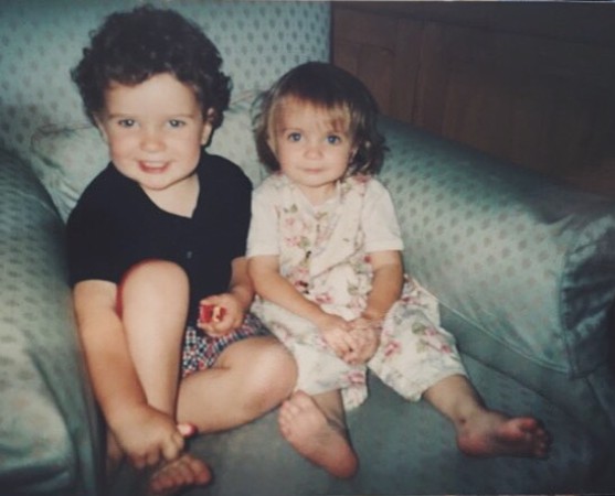 Kate Martineau with her sibling brother in her childhood picture
