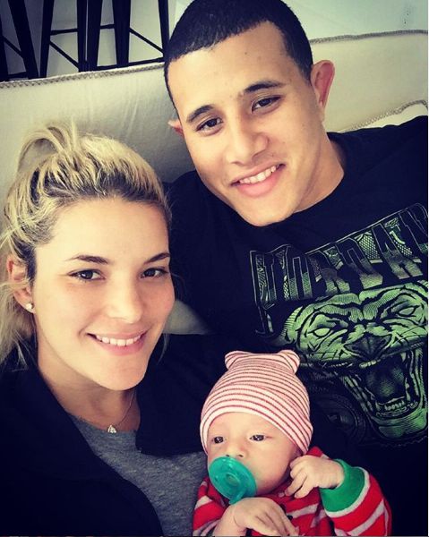 Manny Machado with his wife and son