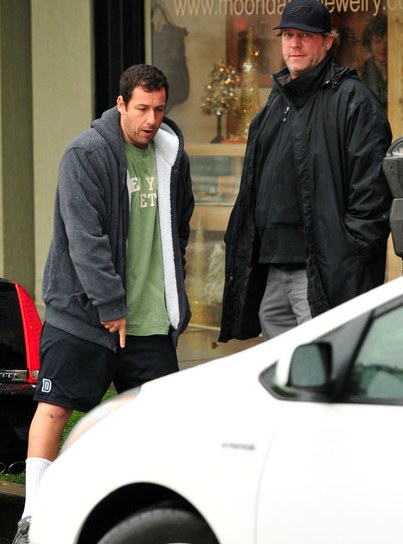 Jonathan Loughran and Adam Sandler with a car