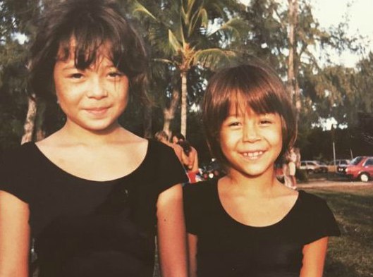 Mandie Taketa with her sister, Kristie during their childhood