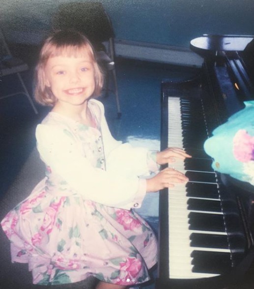Rose Namajunas playing piano in her childhood picture