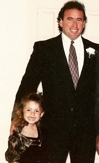 Lindsey Gort with her father in her childhood picture