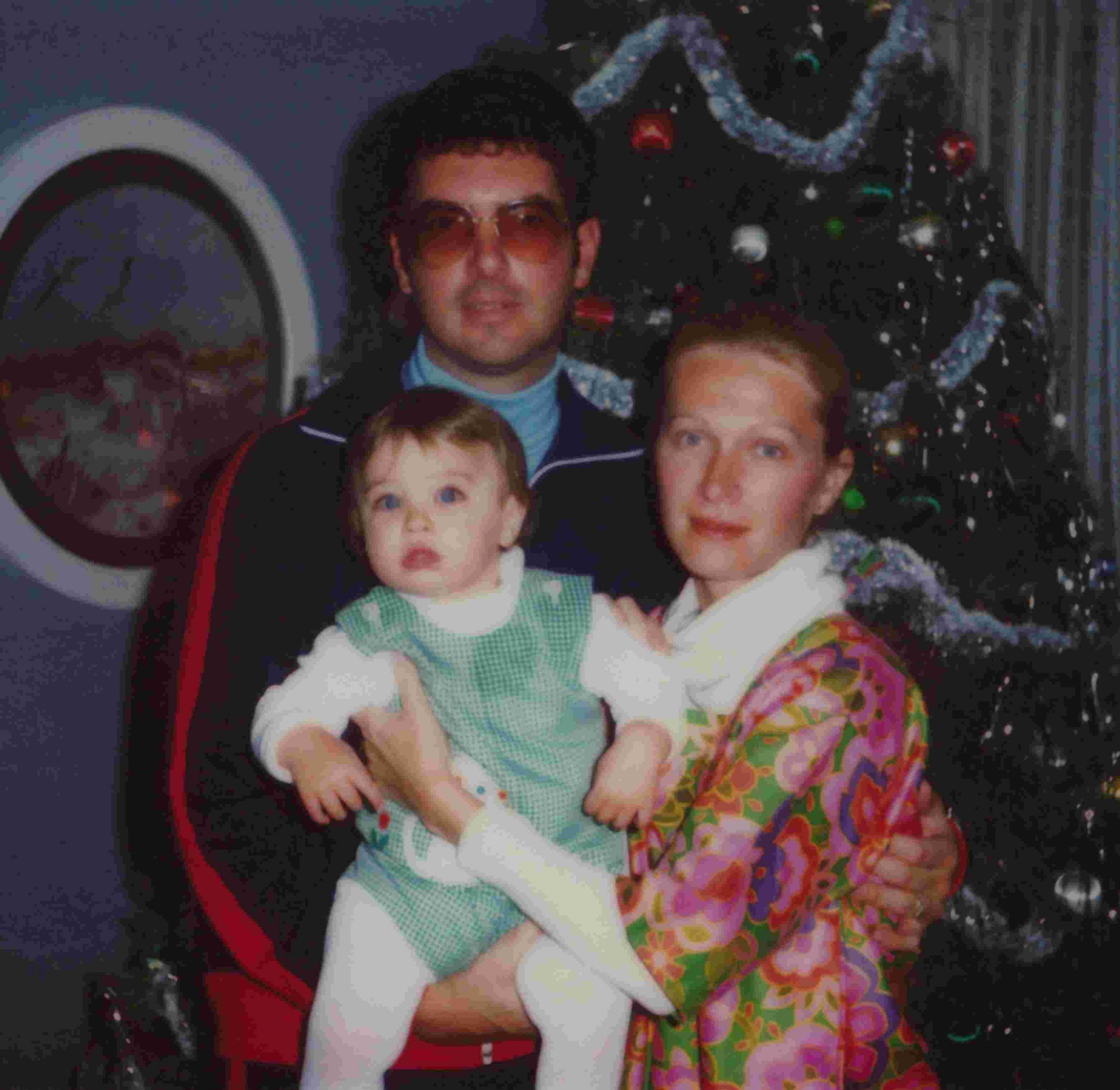 Collier Landry with his parents in childhood picture