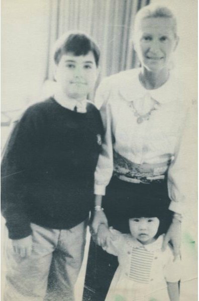 Collier Landry with his adopted sister & mother in his childhood picture