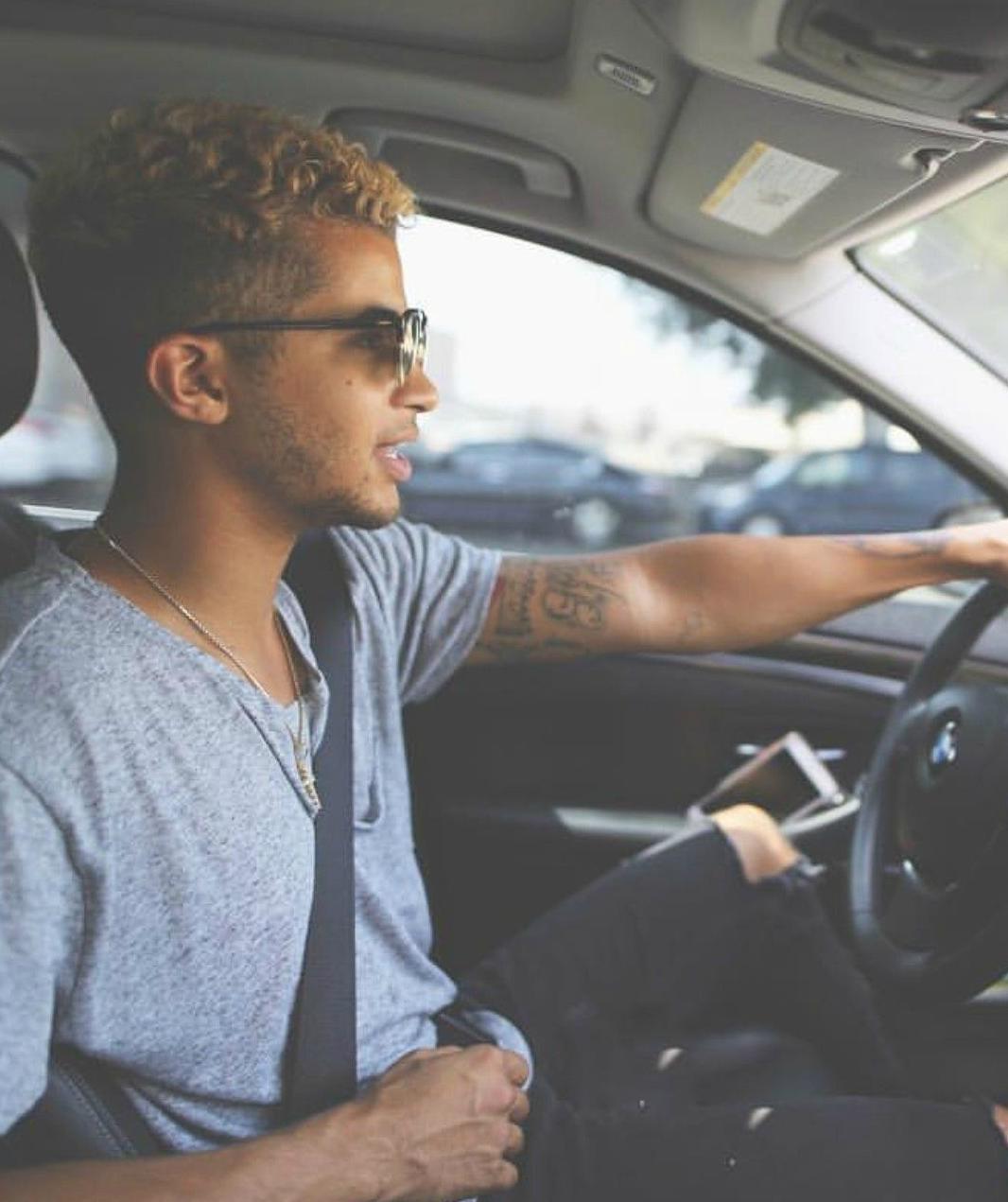 Jordan Fisher driving his car