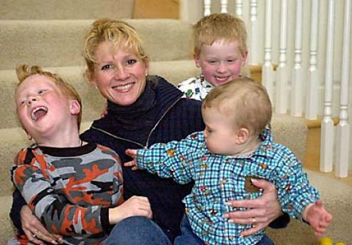 Cindy Gruden with her three sons