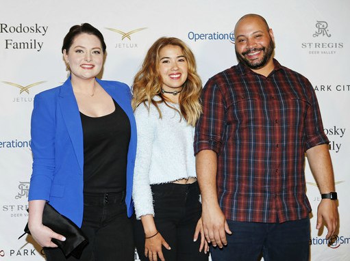 Colton Dunn with his co-workers