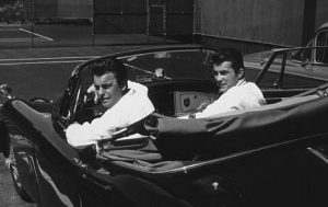 Joan Kenlay's ex-husband, Robert Conrad and his friend on a car