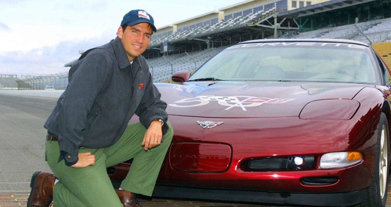 Kerri Browitt Caviezel's husband posing along with his car