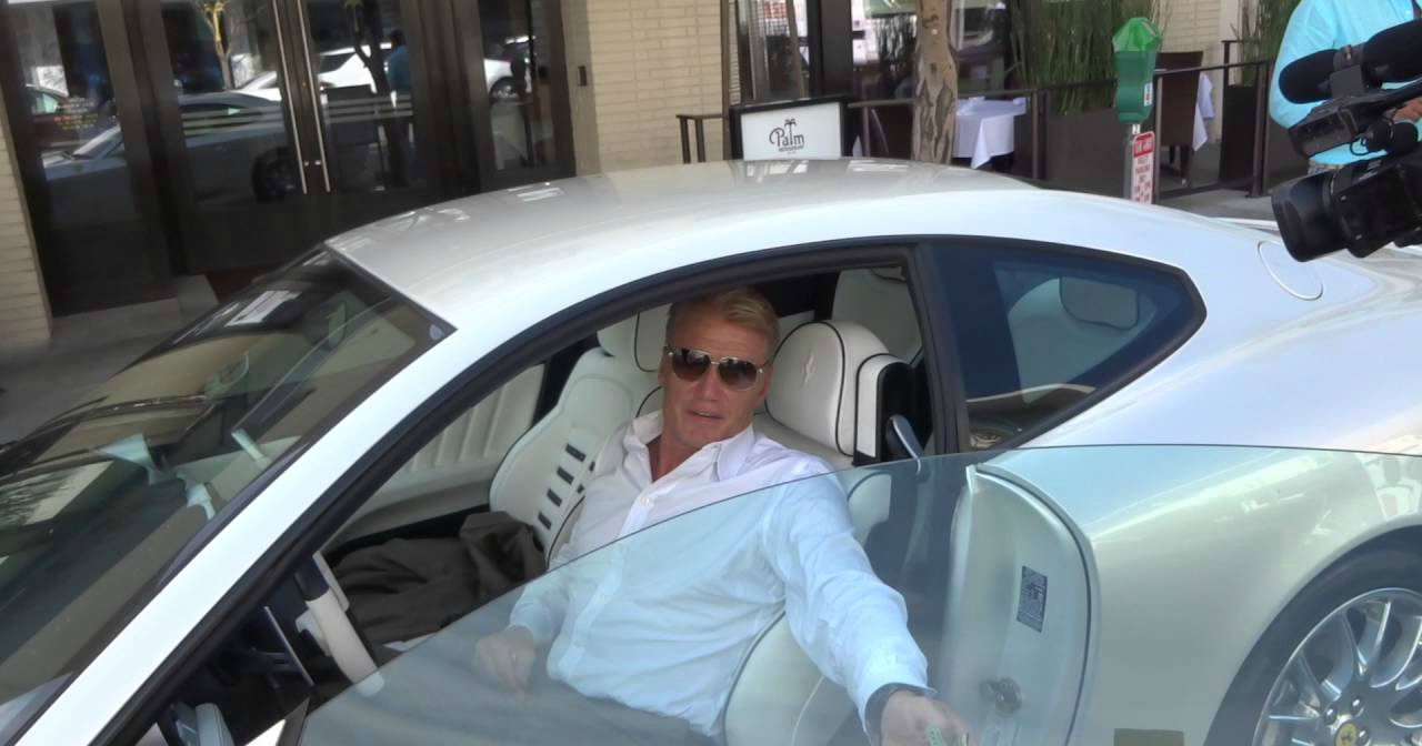 Anette Qviberg with her ex-husband Dolph coming out of his car