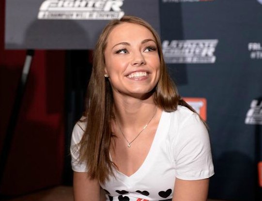 Rose Namajunas picture of her with long hair 