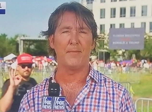 Phil Keating reporting the news