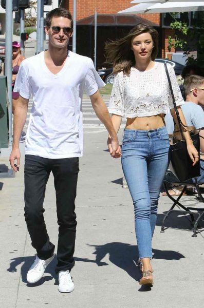 Miranda Kerr walking with spouse Evan Spiegel