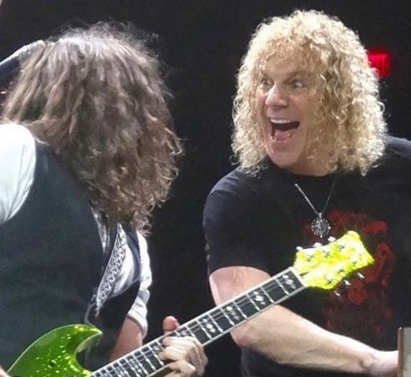David Bryan in a concert with his band & playing keywords