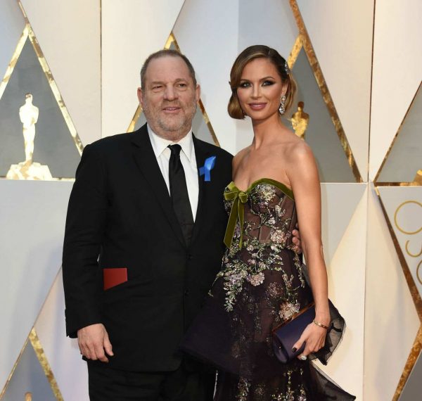 US producer Harvey Weinstein (L) and his wife US designer Georgina Chapman arrive on the red carpet for the 89th Oscars on February 26, 2017 in Hollywood, California