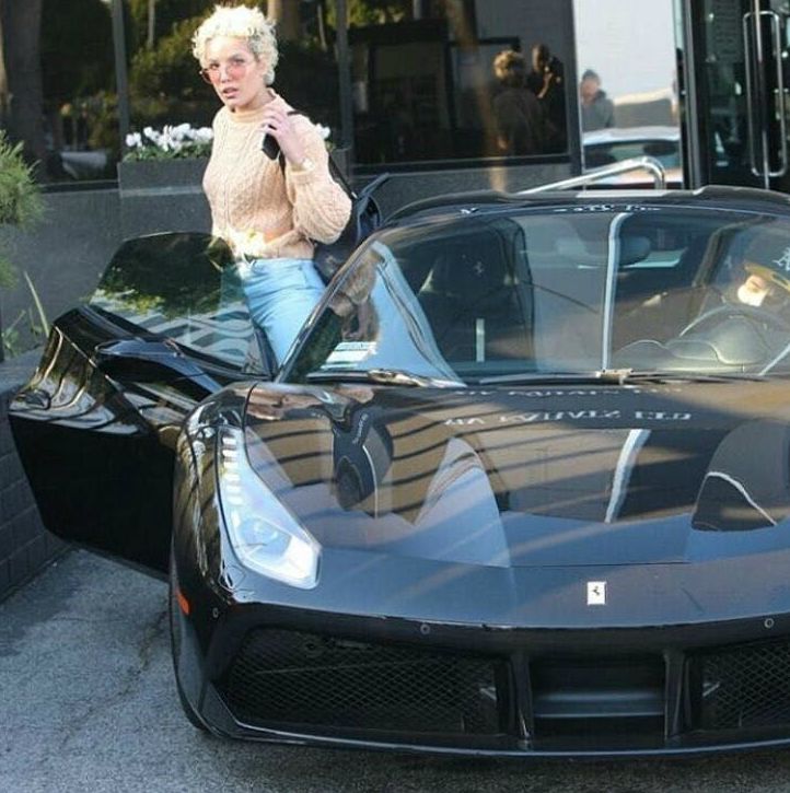 Chris Frangipane's daughter Halsey coming out of her Ferrari car