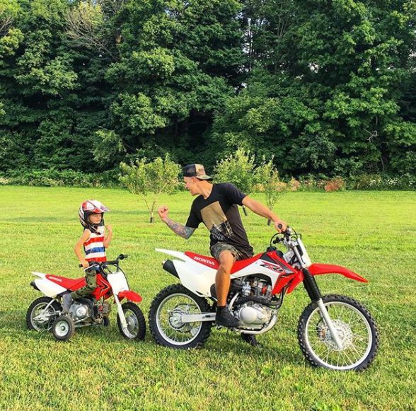 Shanna Riley ex-husband Roman riding bike with his son